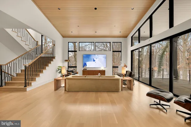 a view of a a dining room with furniture window and outside view