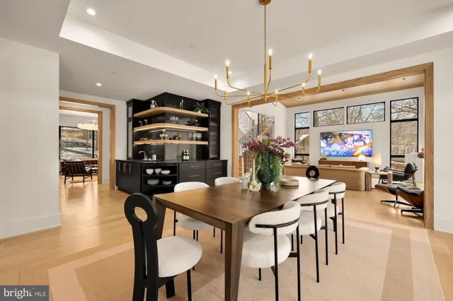 a stove top oven sitting inside of a kitchen