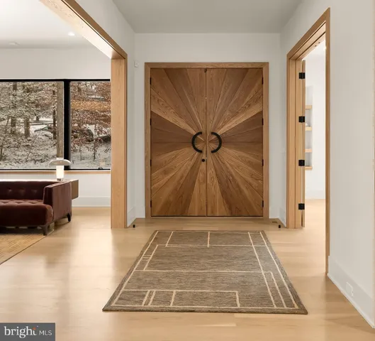 a view of a livingroom with furniture and window