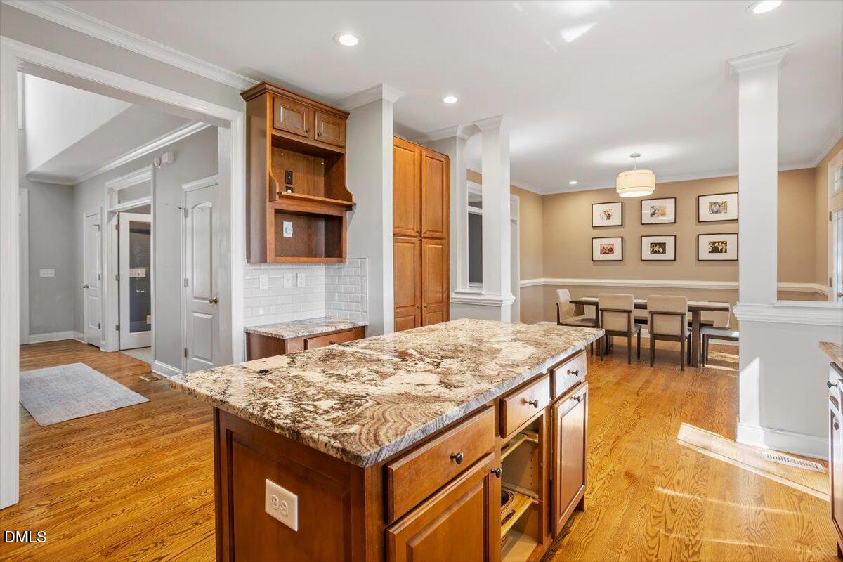 809 Gannett Street Raleigh, NC 27606 - Photo 14 of 41 a kitchen with a table and chairs