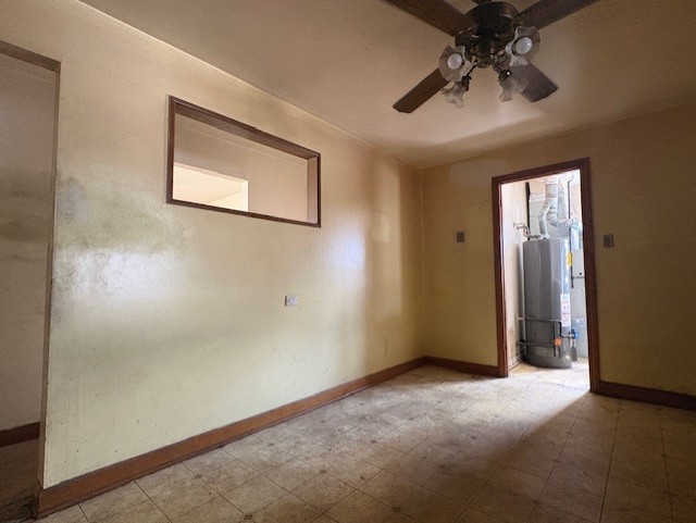 10706 Oak Avenue Chicago Ridge, IL 60415 - Photo 5 of 15 an empty room with a chandelier fan