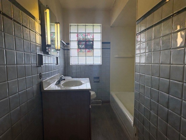 10706 Oak Avenue Chicago Ridge, IL 60415 - Photo 8 of 15 a bathroom with a sink a toilet and shower