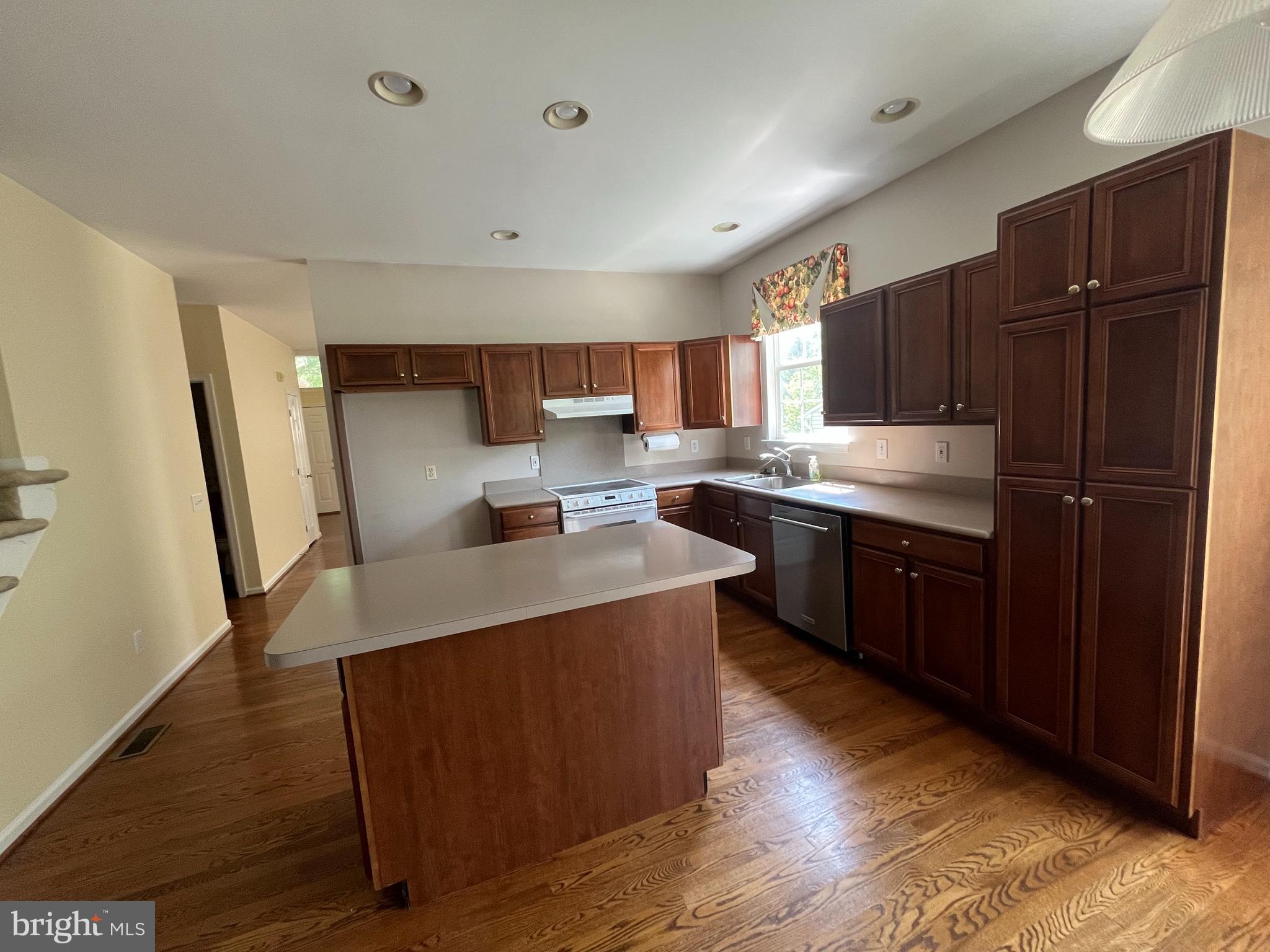 1331 Broad Run Road Landenberg, PA 19350 - Photo 22 of 33 a kitchen with a sink a refrigerator and wooden floor