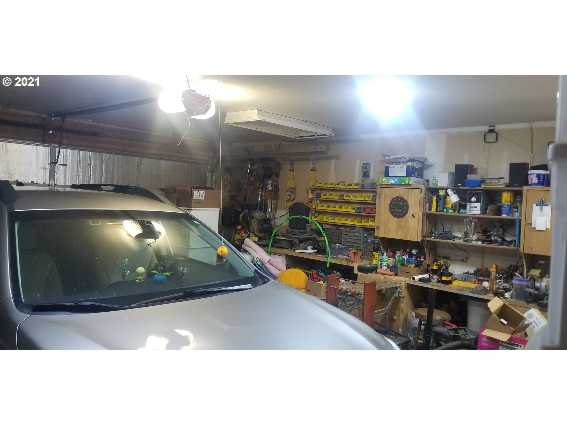 335 Southeast 3rd Street Irrigon, OR 97844 - Photo 20 of 29 a room with lots of different colored cloths