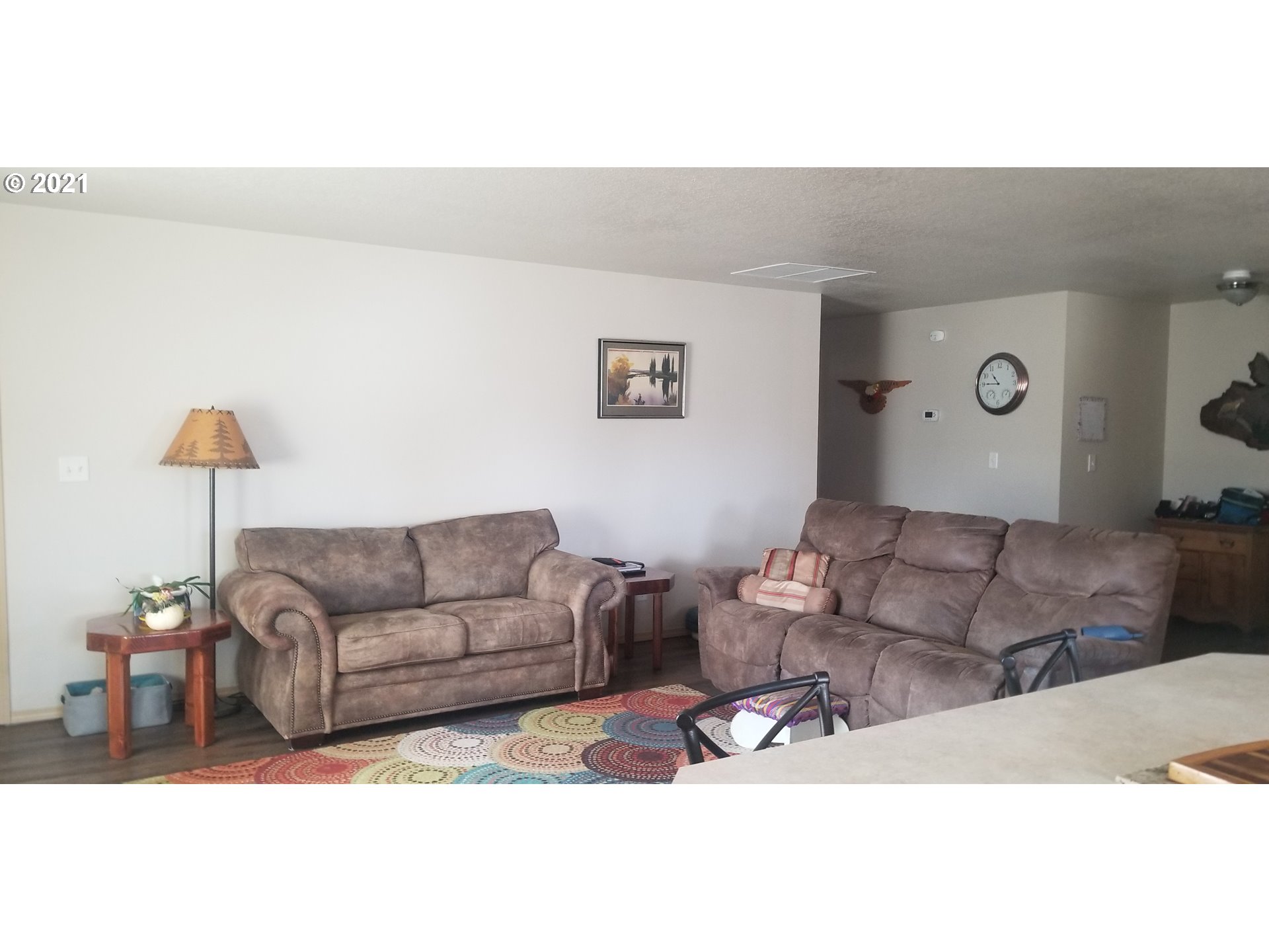 335 Southeast 3rd Street Irrigon, OR 97844 - Photo 3 of 29 a living room with furniture and a couch