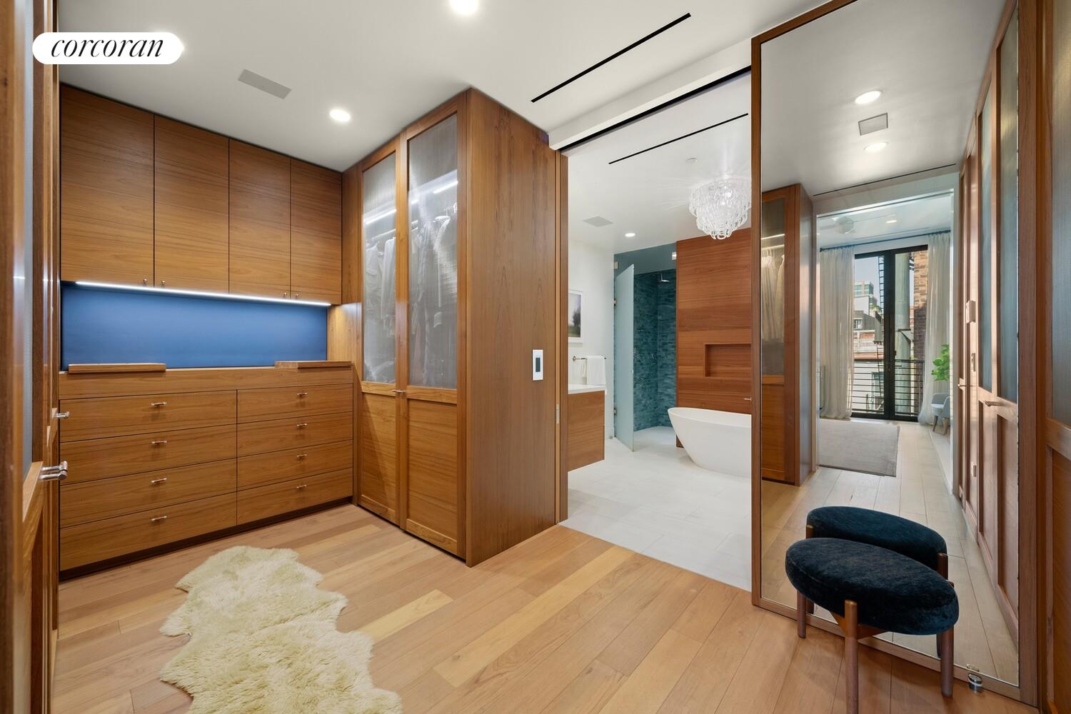 19 Jay Street Manhattan, NY 10013 - Photo 11 of 32 a bathroom with a bathtub and a shower