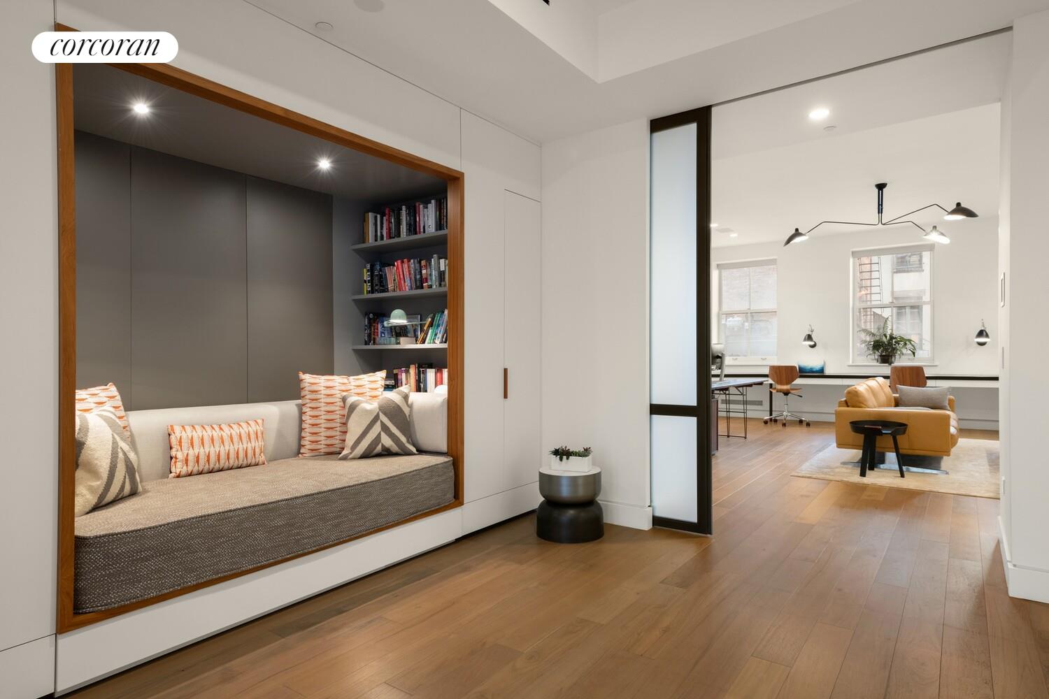 19 Jay Street Manhattan, NY 10013 - Photo 13 of 32 a living room with furniture and a wooden floor