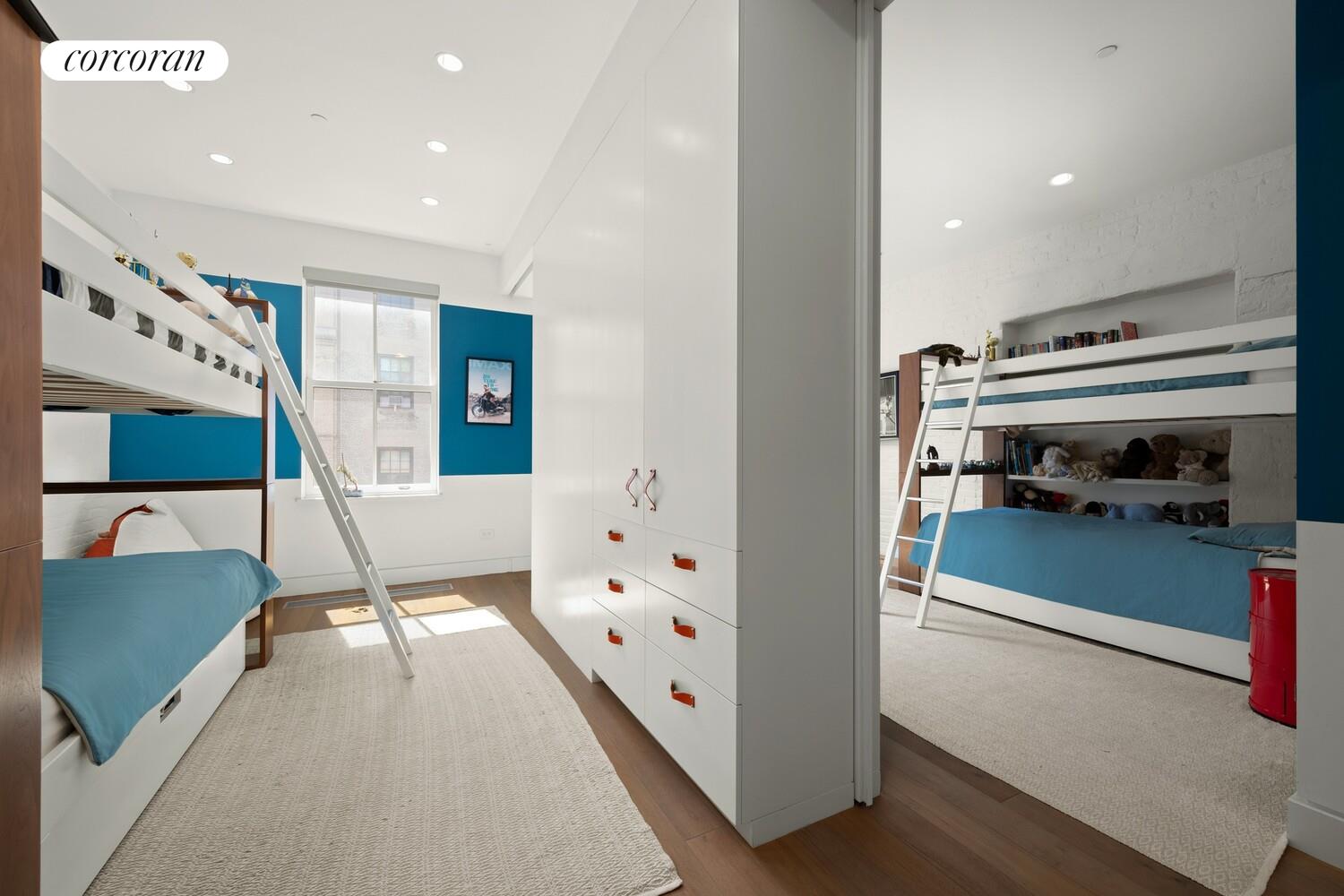 19 Jay Street Manhattan, NY 10013 - Photo 20 of 32 a living room with furniture and a chandelier