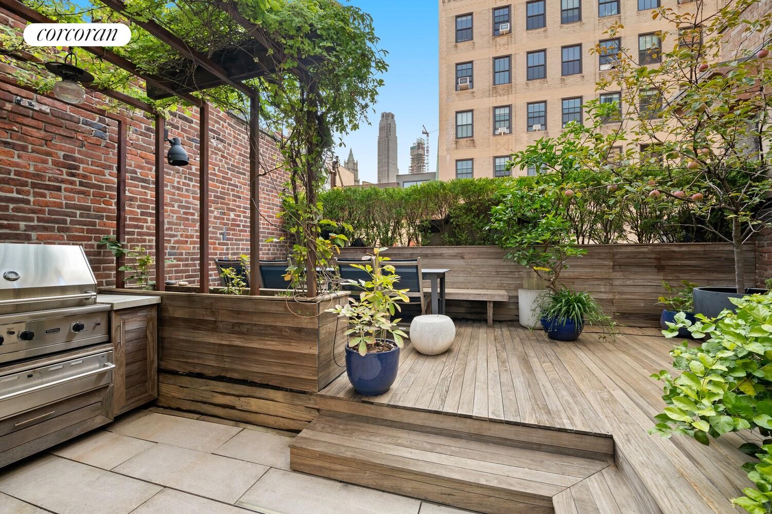 19 Jay Street Manhattan, NY 10013 - Photo 28 of 32 a view of a house with a chairs in patio