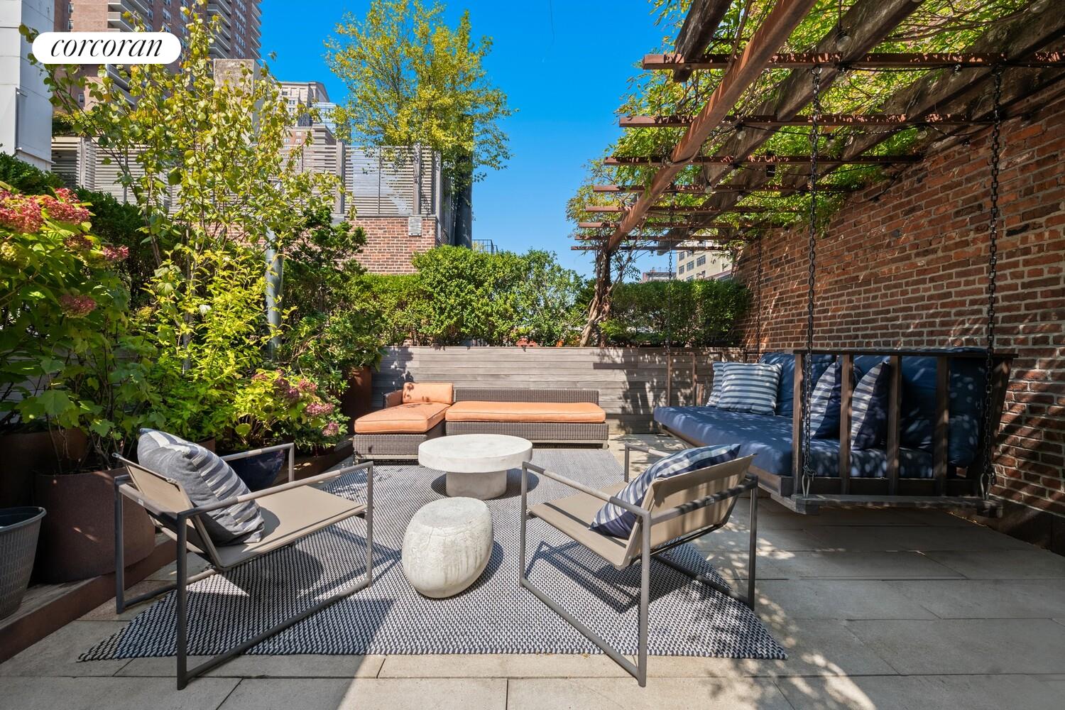 19 Jay Street Manhattan, NY 10013 - Photo 2 of 32 a view of a patio with table and chairs and potted plants