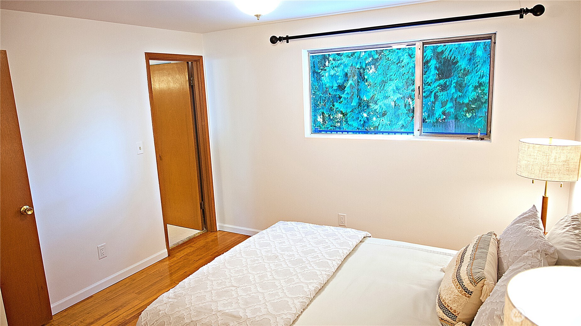 16 234th Place Southeast Bothell, WA 98021 - Photo 14 of 36 a bedroom with a bed and a window