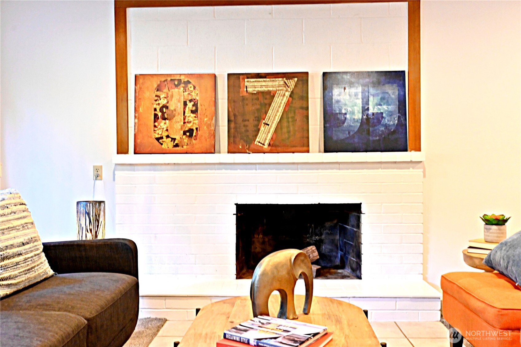 16 234th Place Southeast Bothell, WA 98021 - Photo 21 of 36 a living room with furniture and a fireplace