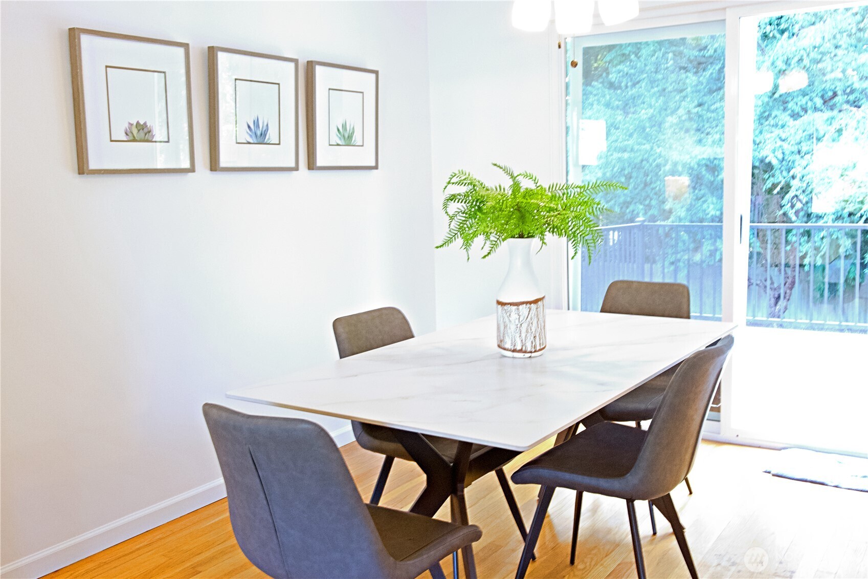 16 234th Place Southeast Bothell, WA 98021 - Photo 7 of 36 a view of a dining room with furniture and a potted plant