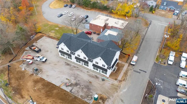 an aerial view of a highlighted house
