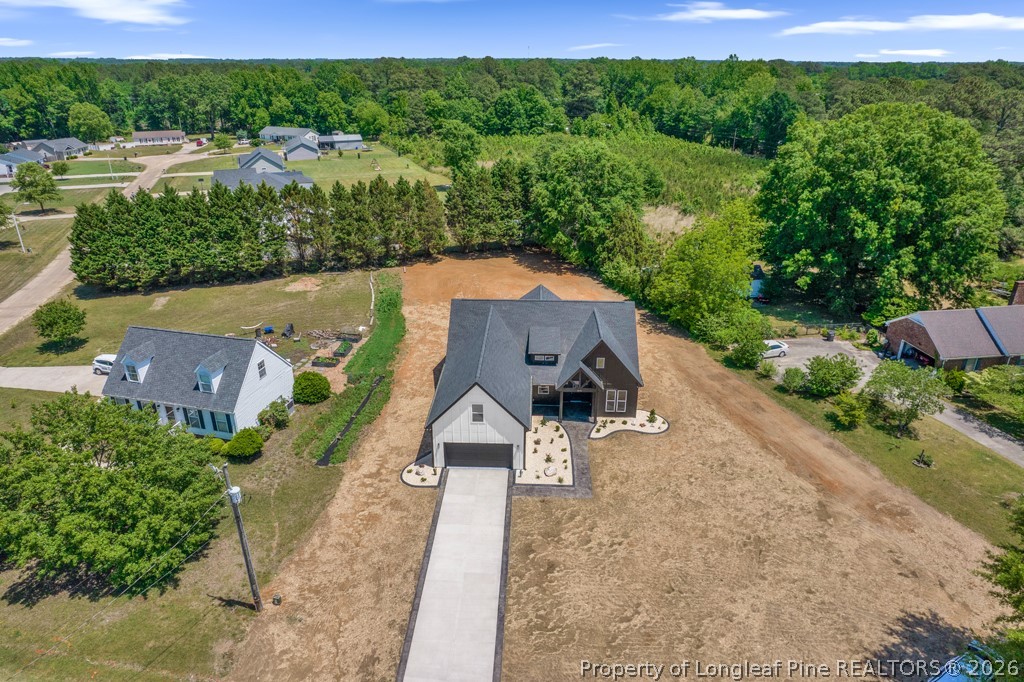 3025 Old Stage Road South Erwin, NC 28339 - Photo 46 of 50 an aerial view of a house with a yard