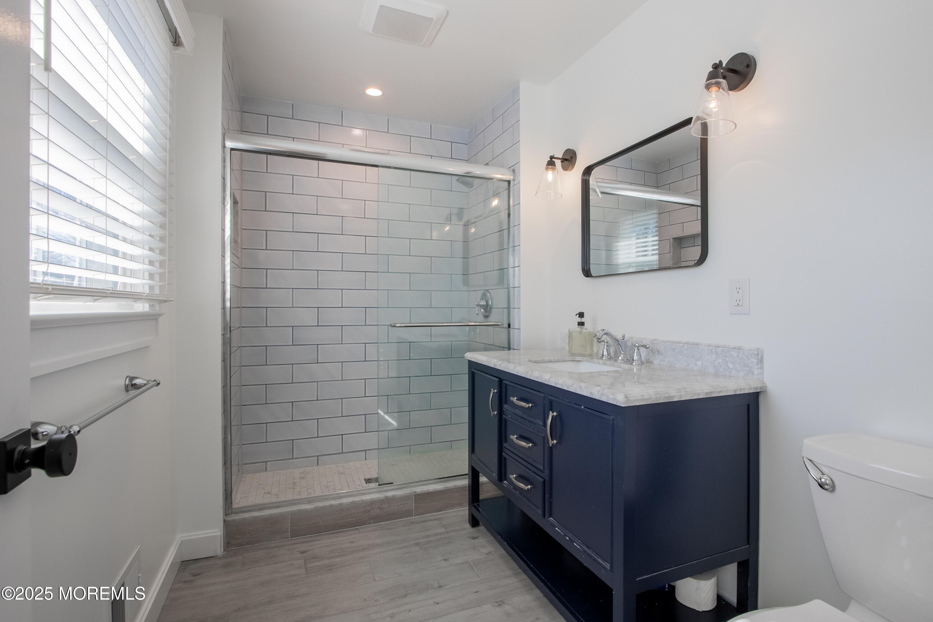 60 Brookside Lane Little Silver, NJ 07739 - Photo 19 of 34 a bathroom with a granite countertop sink toilet and shower