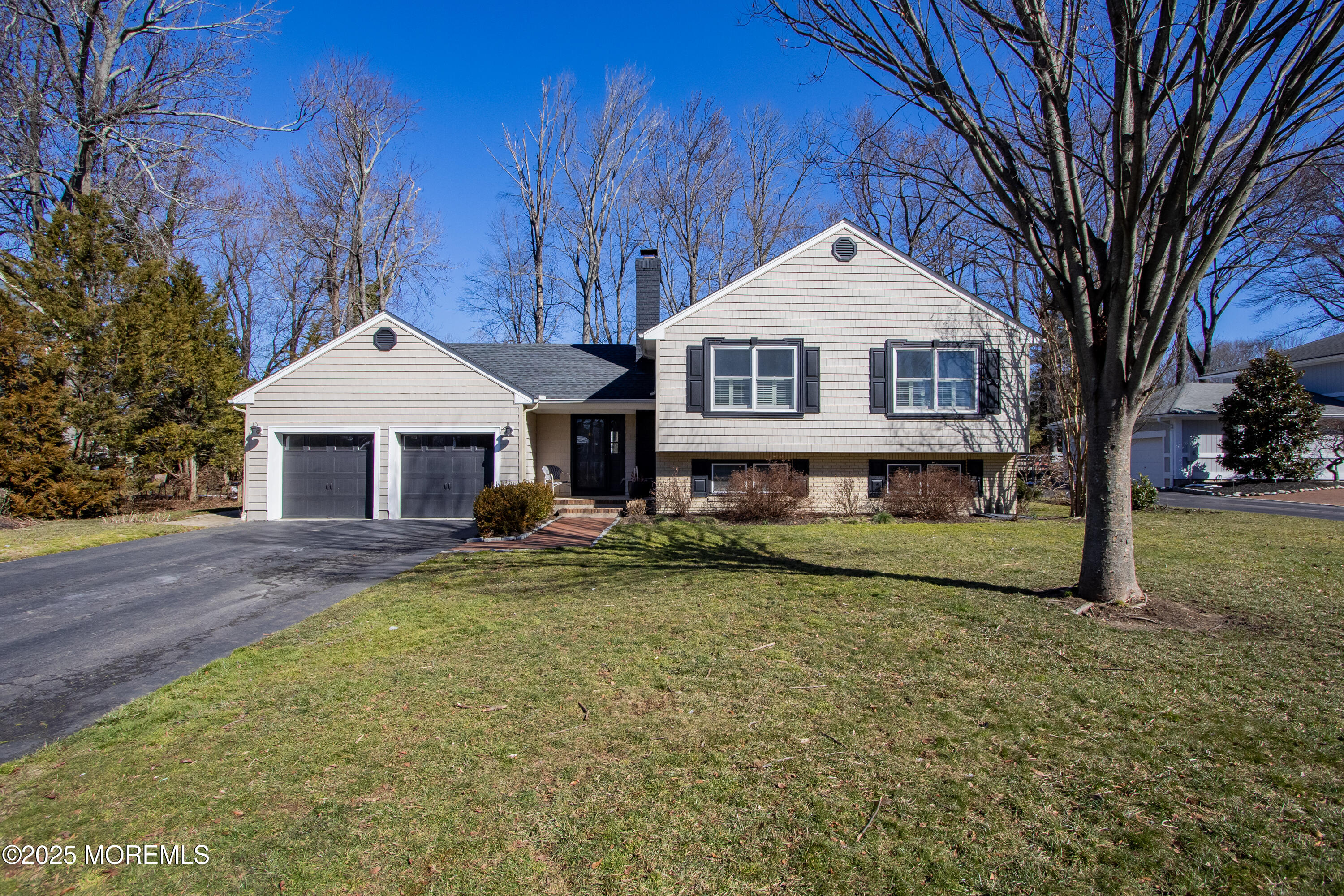60 Brookside Lane Little Silver, NJ 07739 - Photo 2 of 34 a view of a house with a yard