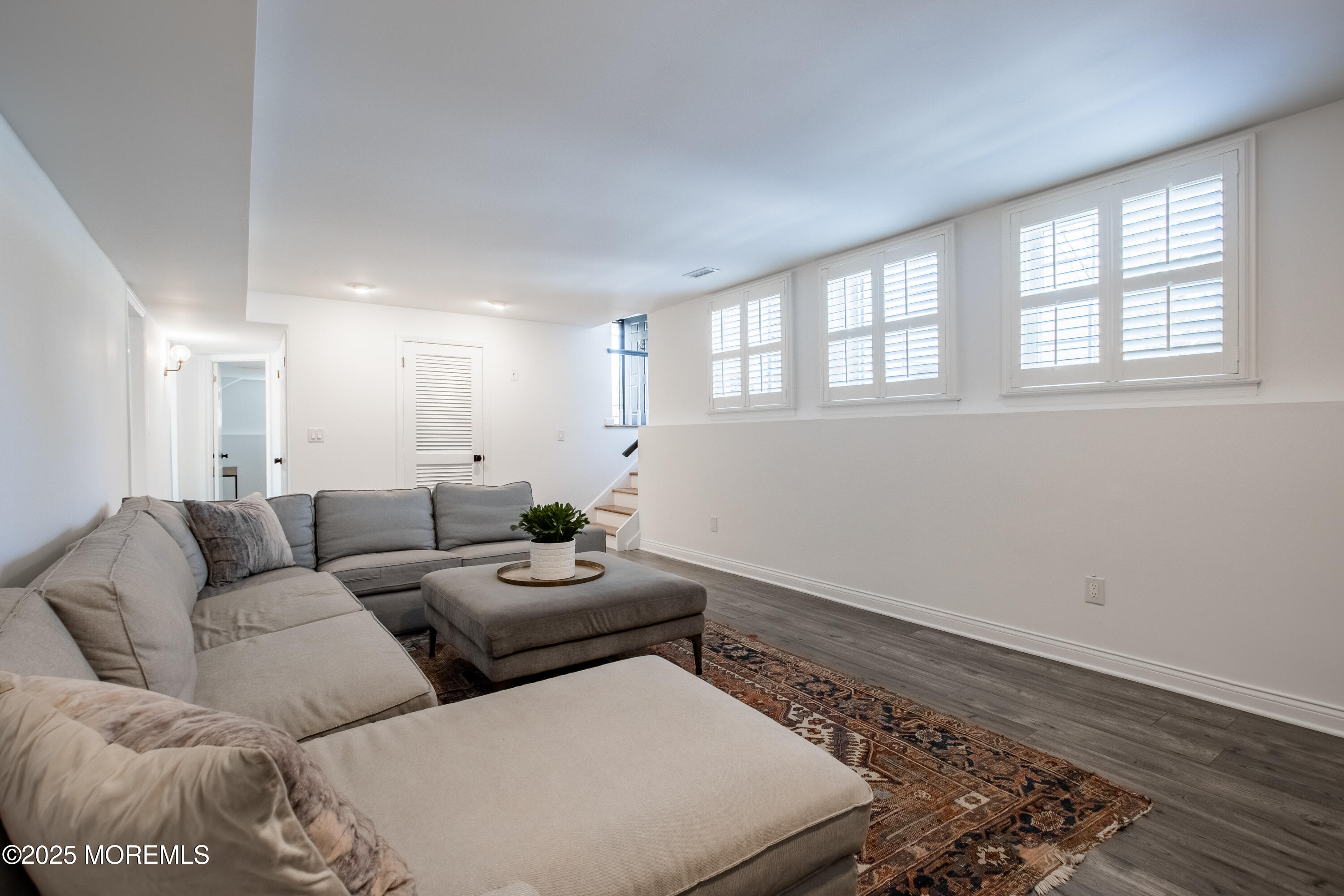 60 Brookside Lane Little Silver, NJ 07739 - Photo 27 of 34 a living room with furniture and a window