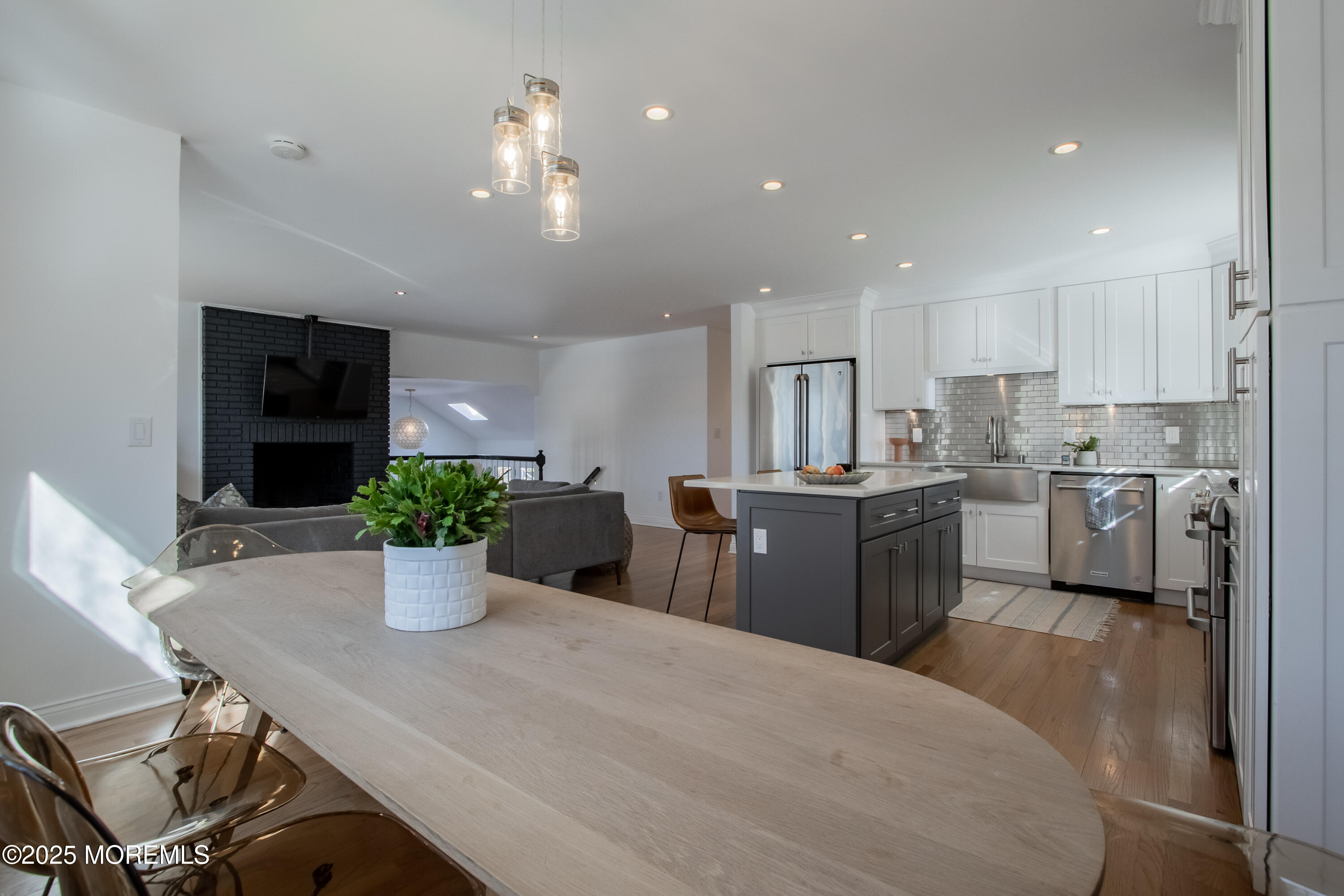 60 Brookside Lane Little Silver, NJ 07739 - Photo 7 of 34 a kitchen with a dining table chairs and appliances