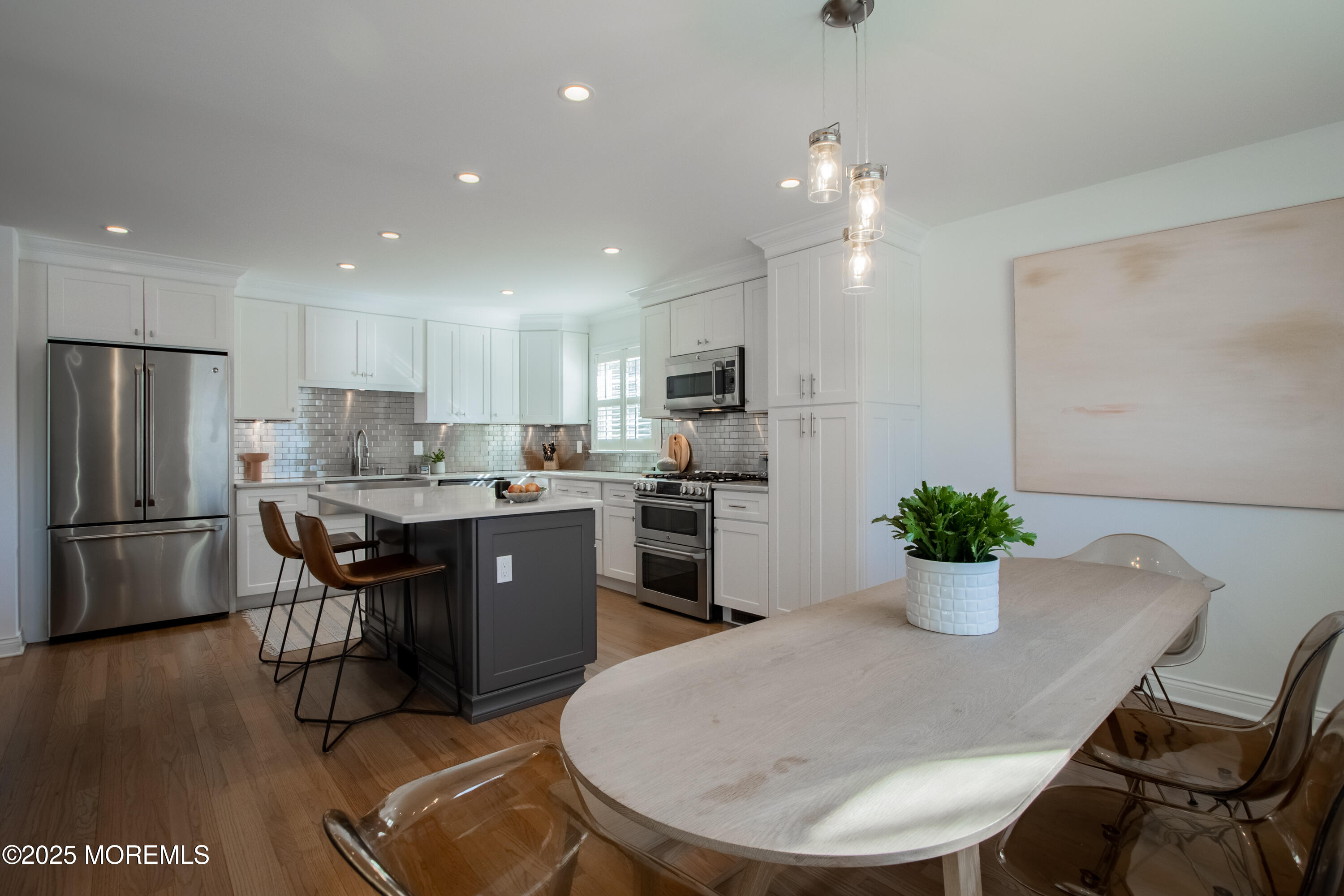 60 Brookside Lane Little Silver, NJ 07739 - Photo 8 of 34 a kitchen with a table and chairs