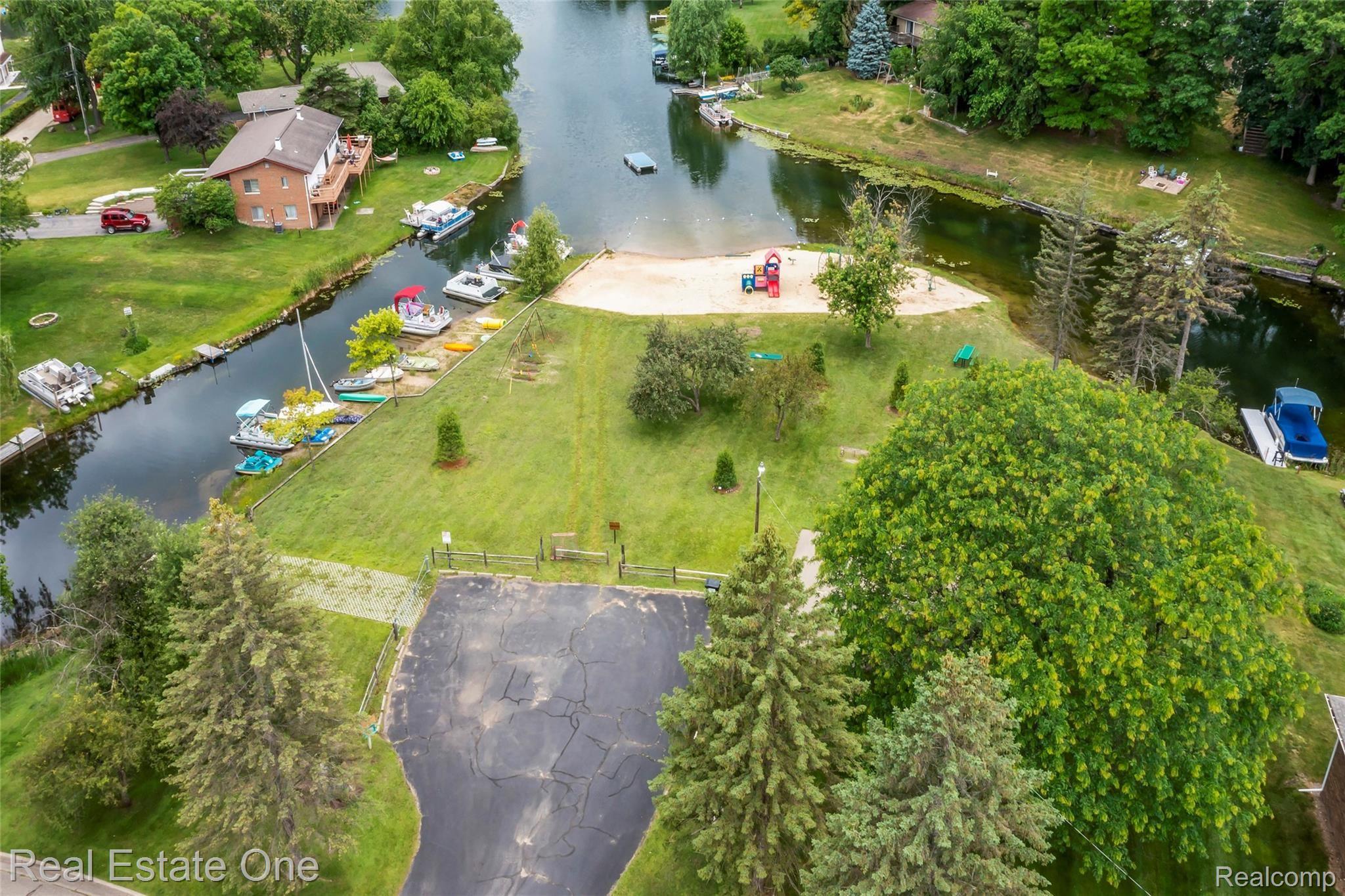 5360 Greenfield Road Brighton, MI 48114 - Photo 41 of 44 Sandy beech, boat mooring and more.