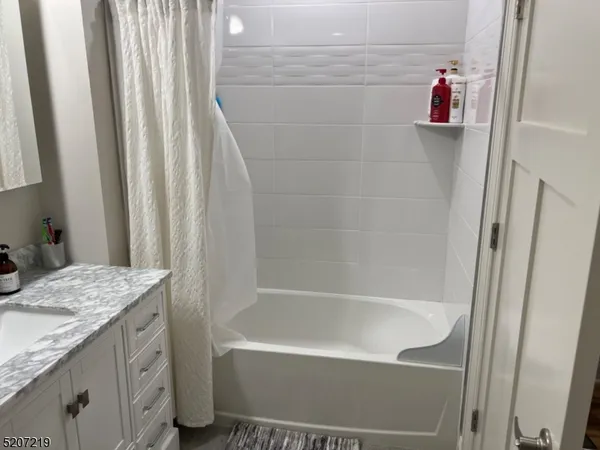 a bed room with a bed and television