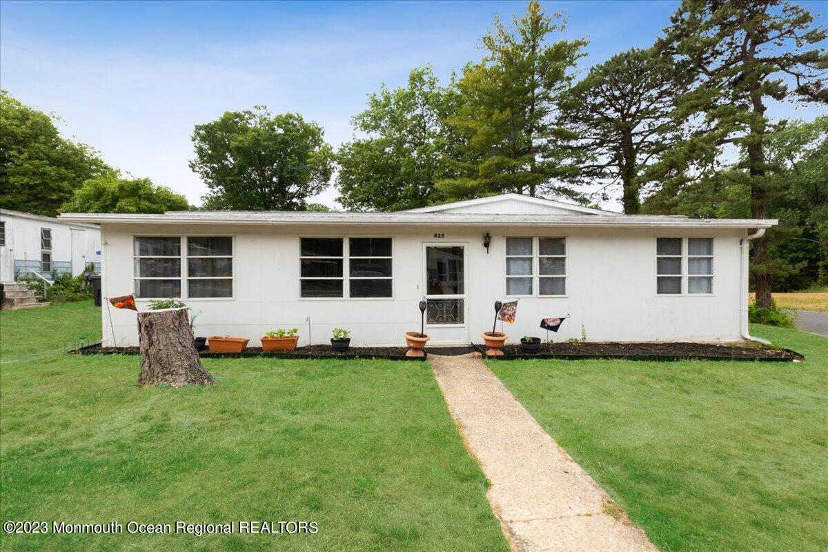 422 Roberts Road Toms River, NJ 08755 - Photo 2 of 18 a front view of house with yard and green space