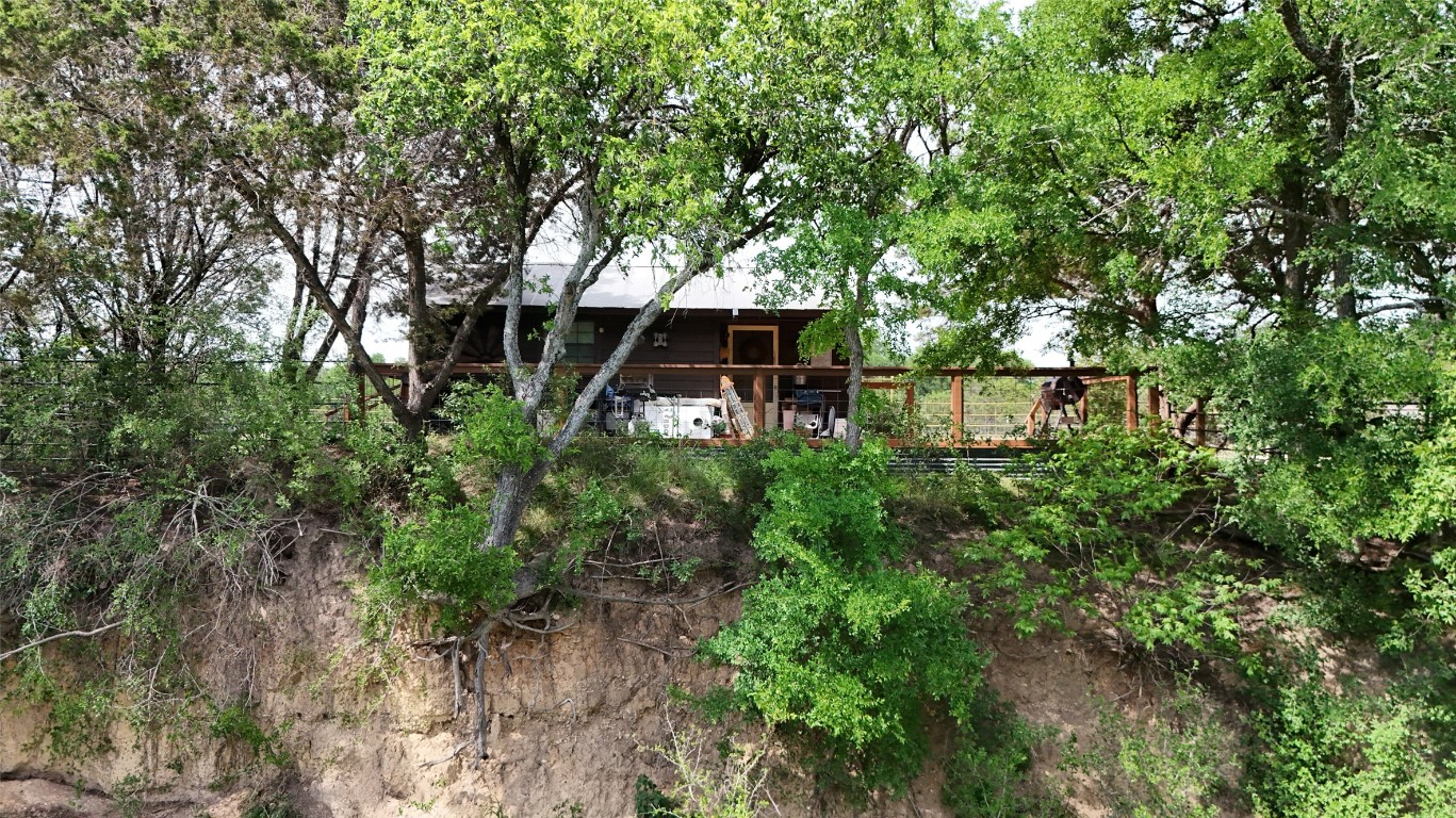 835 County Road 256 Liberty Hill, TX 78642 - Photo 17 of 34 Back of house with a deck