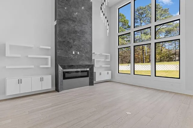 a view of a kitchen with a dishwasher and cabinets