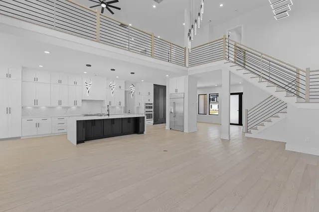 a bathroom with a toilet a sink and a mirror