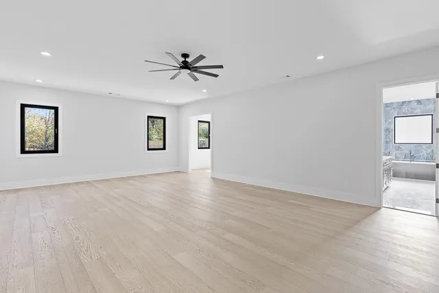a bathroom with a sink a mirror and a shower