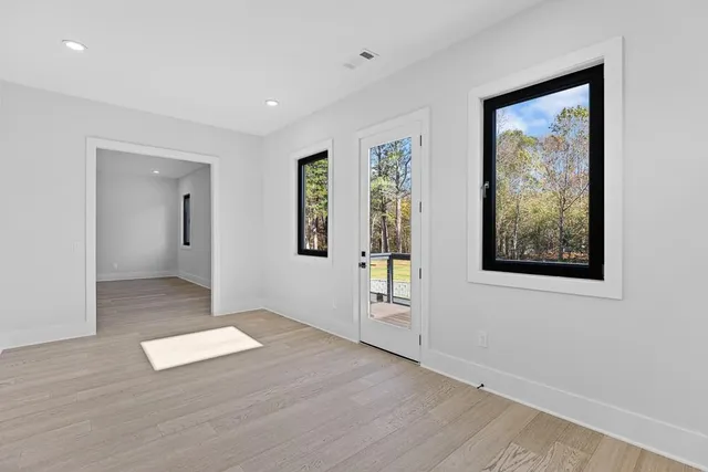 a view of an empty room and window