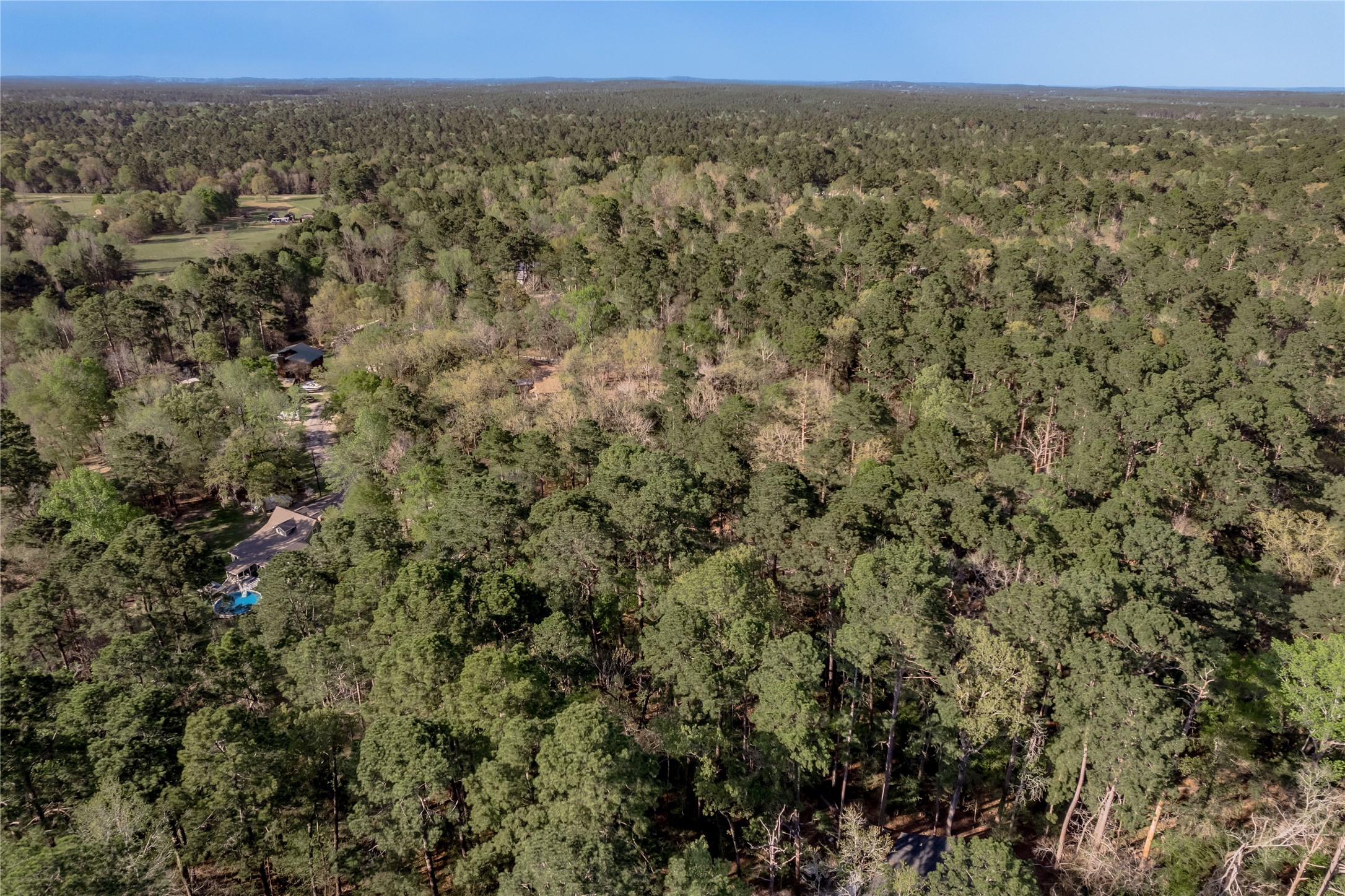 0 Holly Lane Trinity, TX 75862 - Photo 20 of 27 a view of a city with lush green forest