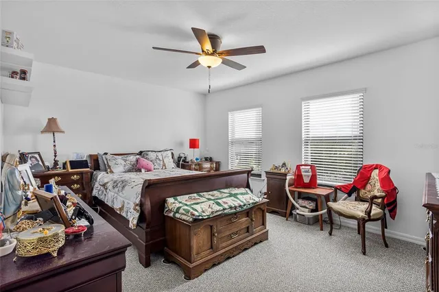 a bed room with furniture and air hockey table