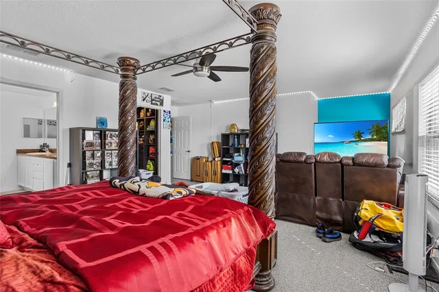 a bedroom with a bed and a walk in closet