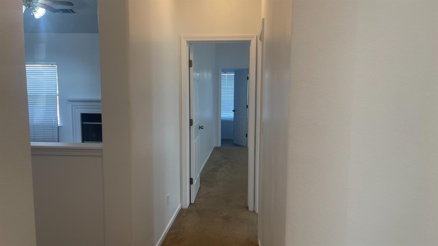 1400 Bay Street Lemoore, CA 93245 - Photo 11 of 21 a view of a hallway with a hallway
