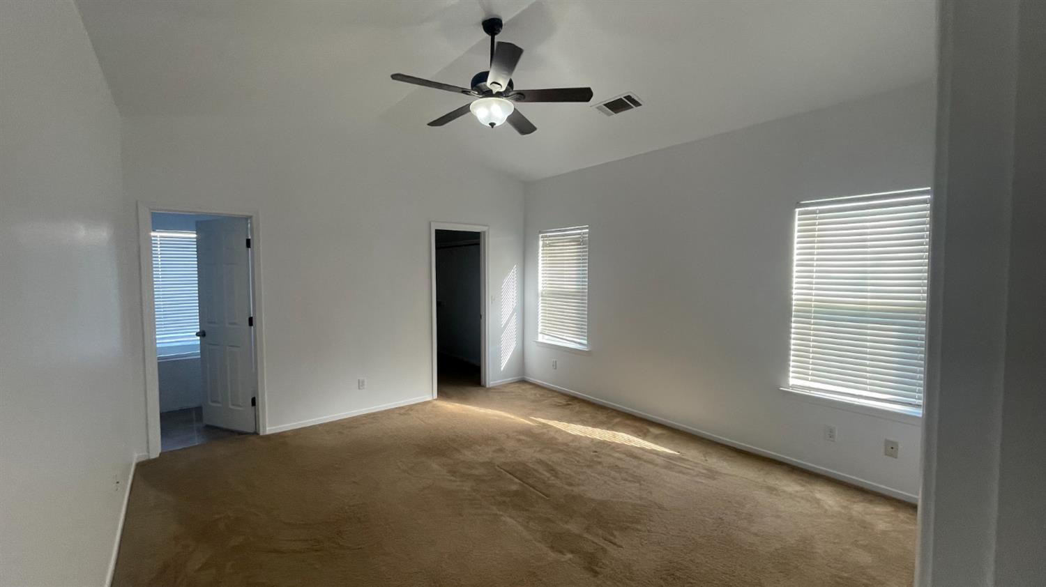 1400 Bay Street Lemoore, CA 93245 - Photo 13 of 21 a view of a livingroom with a ceiling fan and window