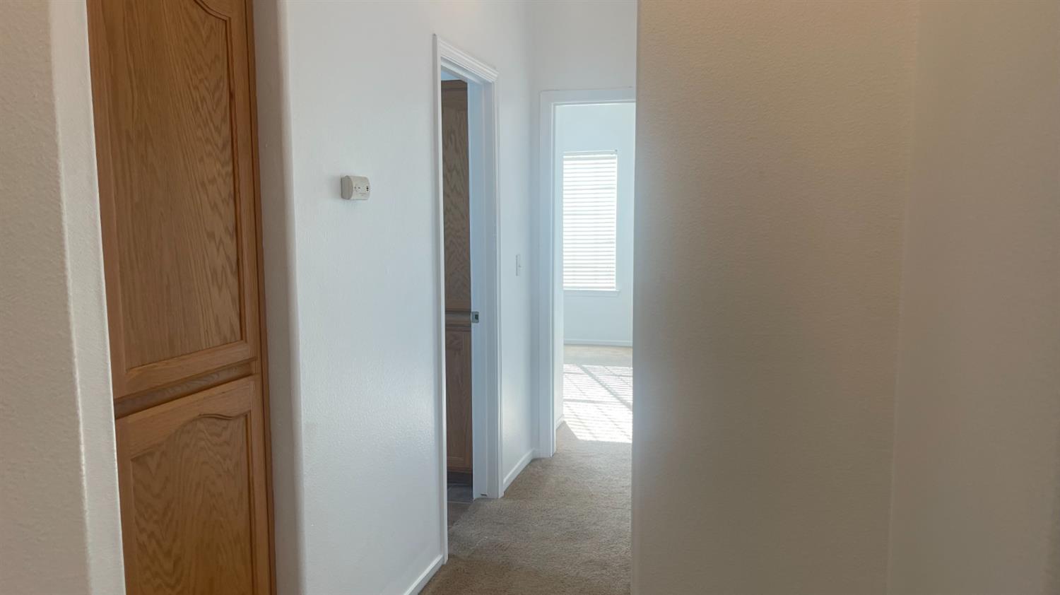 1400 Bay Street Lemoore, CA 93245 - Photo 7 of 21 a view of a hallway with a closet