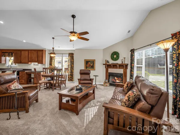 a bedroom with a bed dresser and a couch
