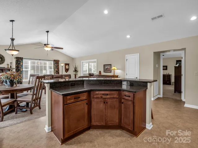 a kitchen with counter top space and sink