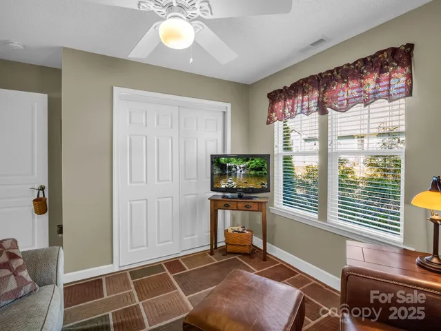 a room with furniture and a window