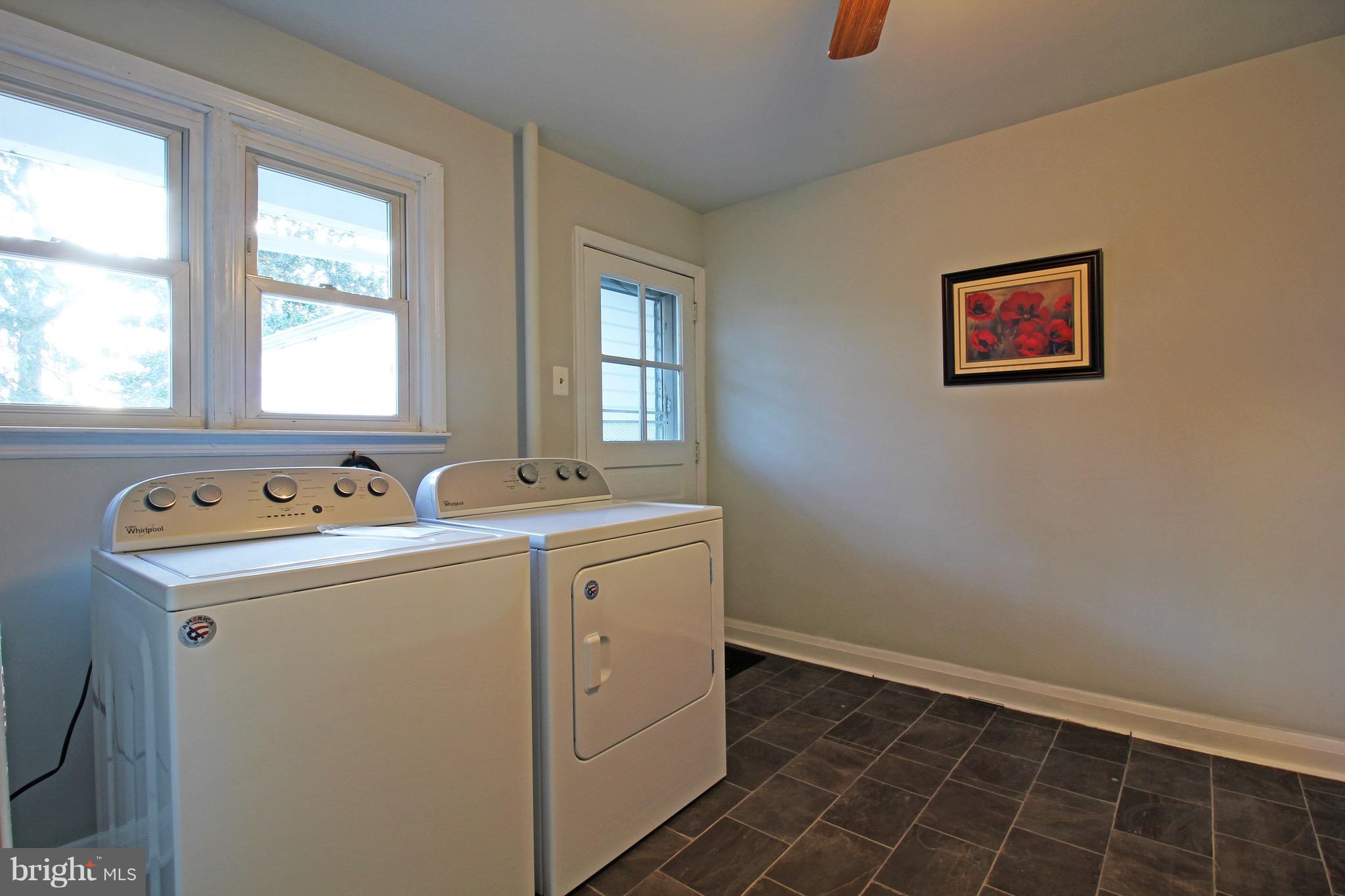 1217 Hillside Road Pasadena, MD 21122 - Photo 13 of 24 a utility room with dryer and washer