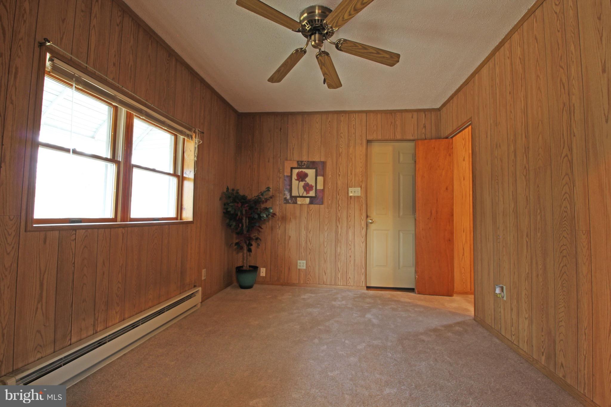1217 Hillside Road Pasadena, MD 21122 - Photo 14 of 24 a view of empty room with windows
