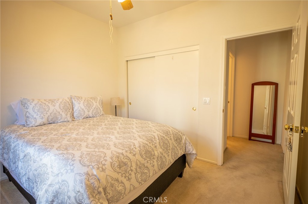 12207 Vía Santa Marta Sylmar, CA 91342 - Photo 14 of 39 a large bed sitting in a bedroom next to a window