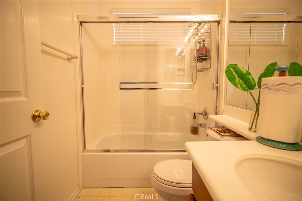 12207 Vía Santa Marta Sylmar, CA 91342 - Photo 16 of 39 a bathroom with a sink a toilet and shower