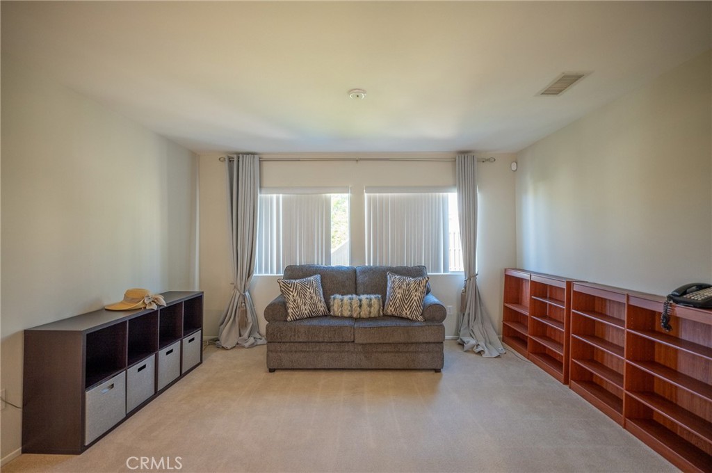 12207 Vía Santa Marta Sylmar, CA 91342 - Photo 20 of 39 a living room with furniture and a window