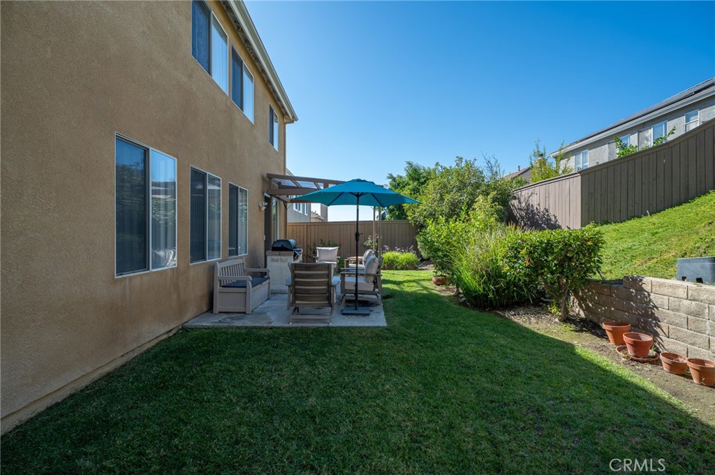 12207 Vía Santa Marta Sylmar, CA 91342 - Photo 36 of 39 a view of a house with backyard porch and sitting area