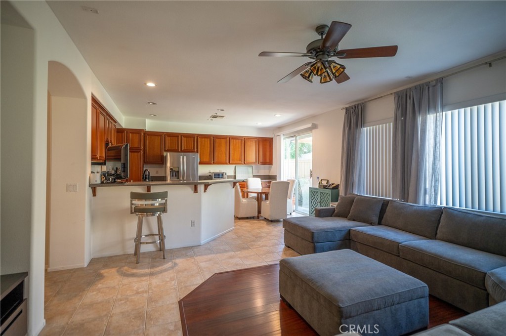 12207 Vía Santa Marta Sylmar, CA 91342 - Photo 4 of 39 a living room with furniture and kitchen view