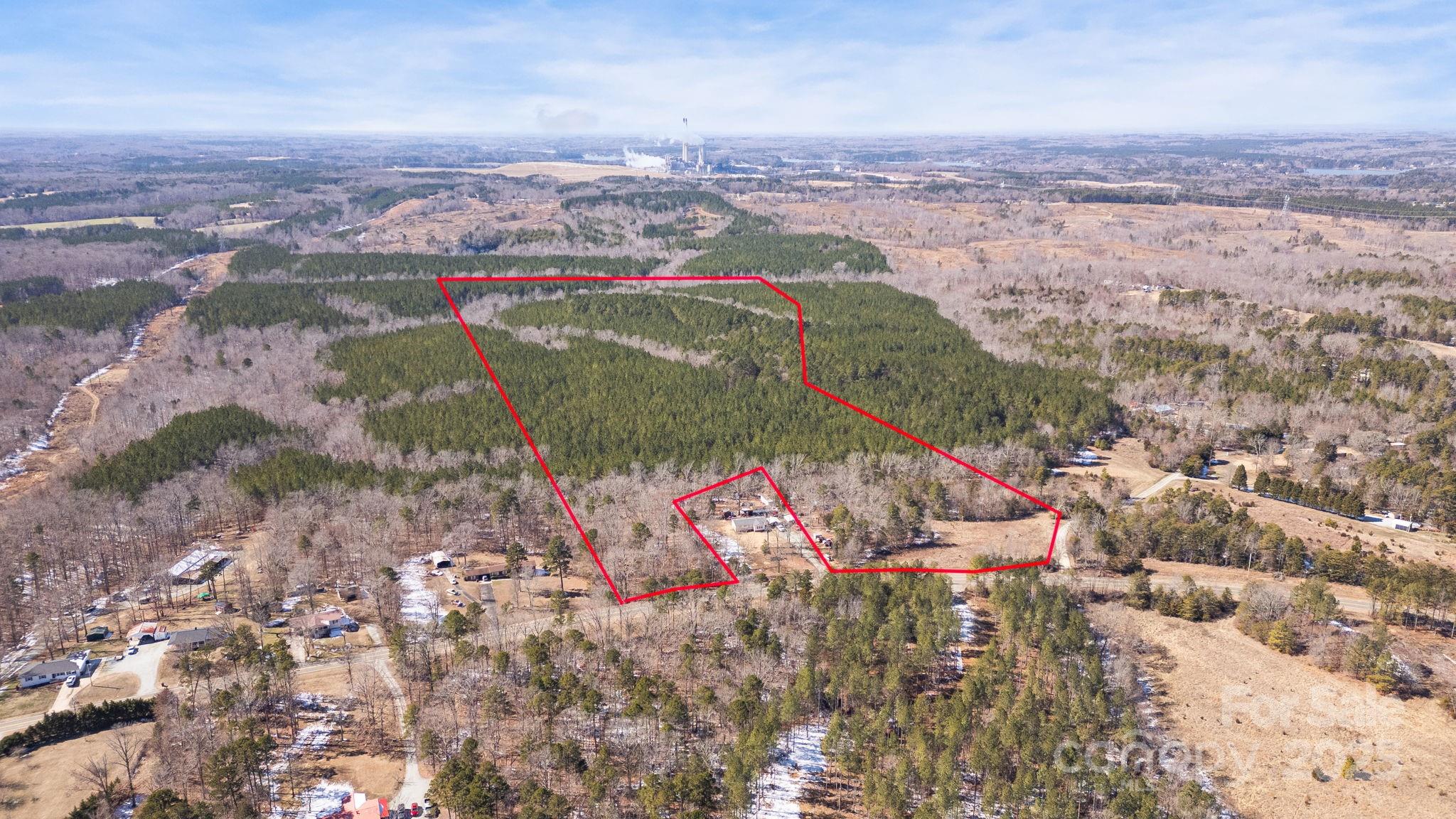 0 Alva Oakley Road Roxboro, NC 27574 - Photo 4 of 5 an aerial view of residential houses with outdoor space