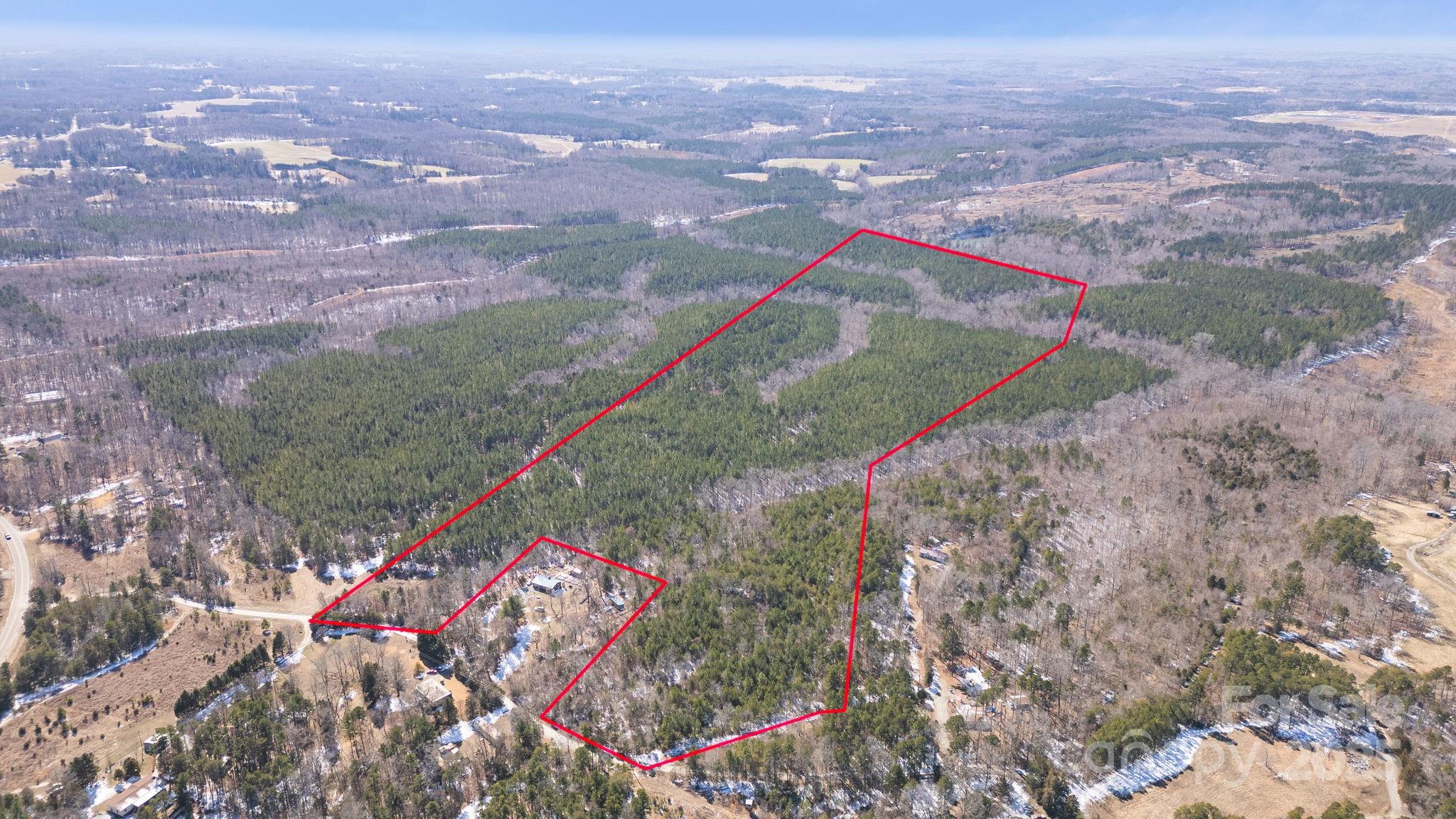 0 Alva Oakley Road Roxboro, NC 27574 - Photo 5 of 5 an aerial view of residential houses with outdoor space